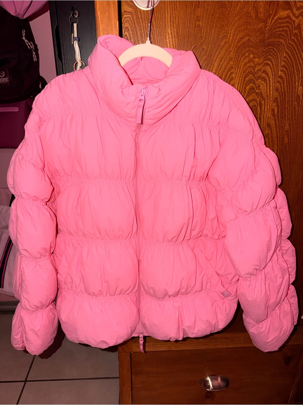 Pink puffer jacket